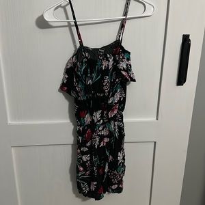 Spaghetti strap floral black romper.